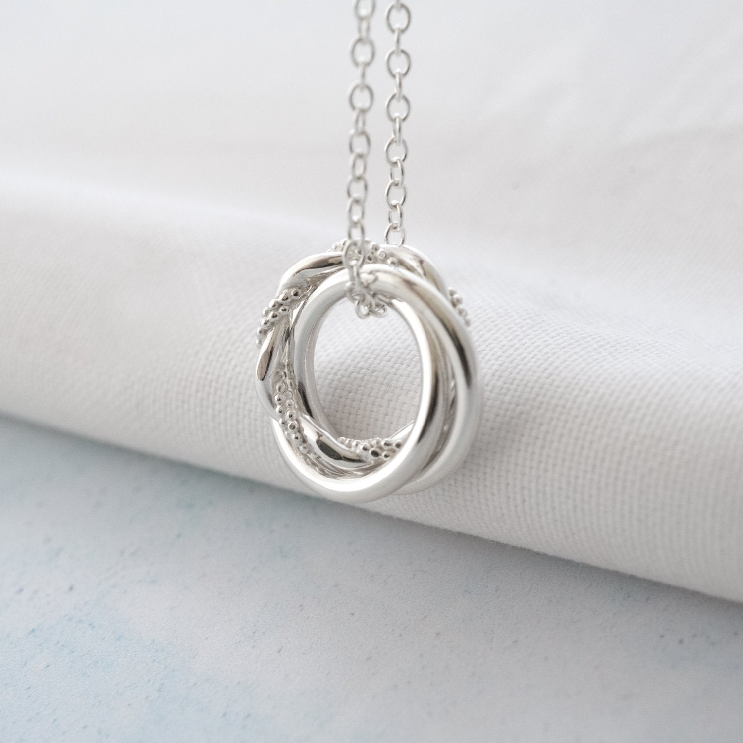 Equilibrium Necklace – Three Rings (30 Years)