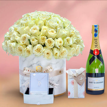 Premium White Roses, Moet, and Van Roy Chocolate