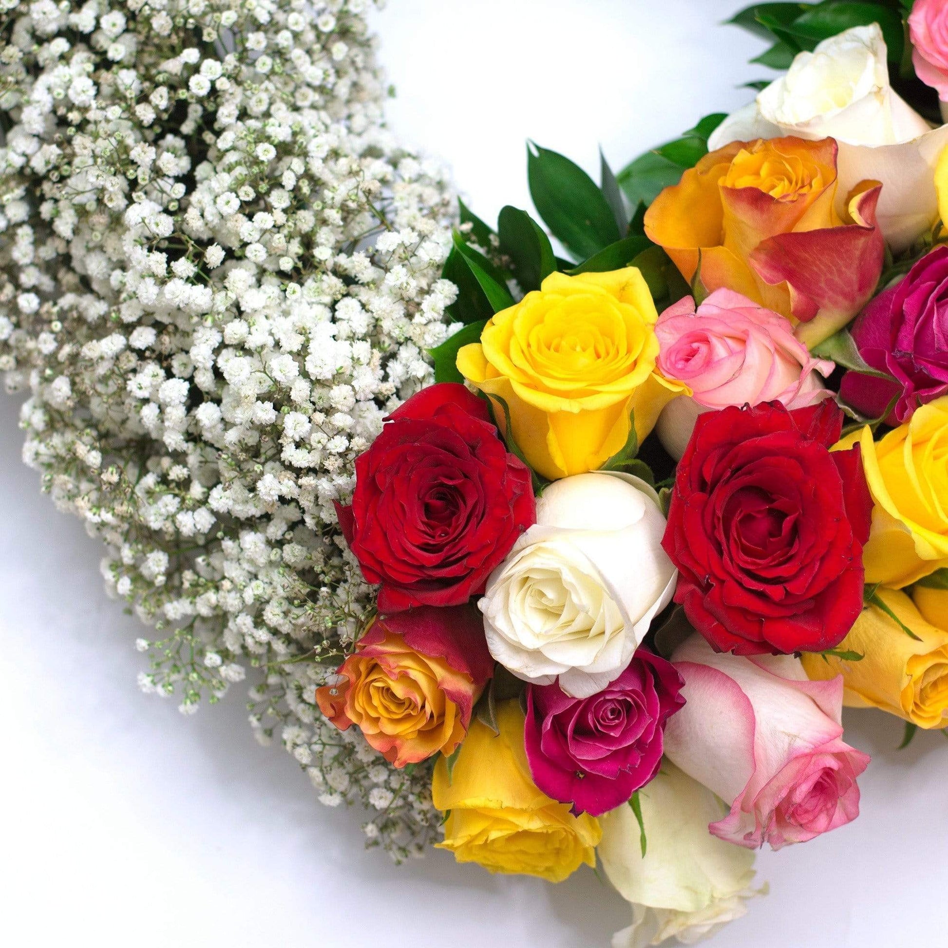 Mixed Rose and Baby Breath Funeral Heart